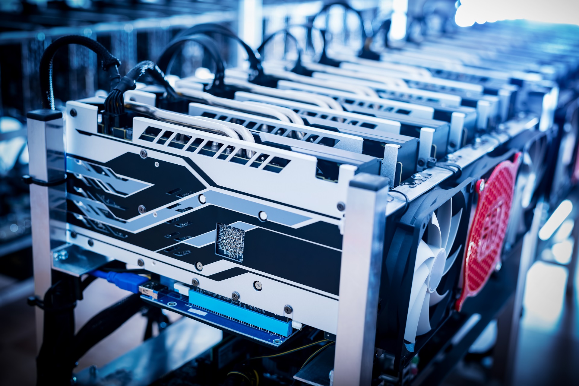 Bitcoin mining devices standing in a row.